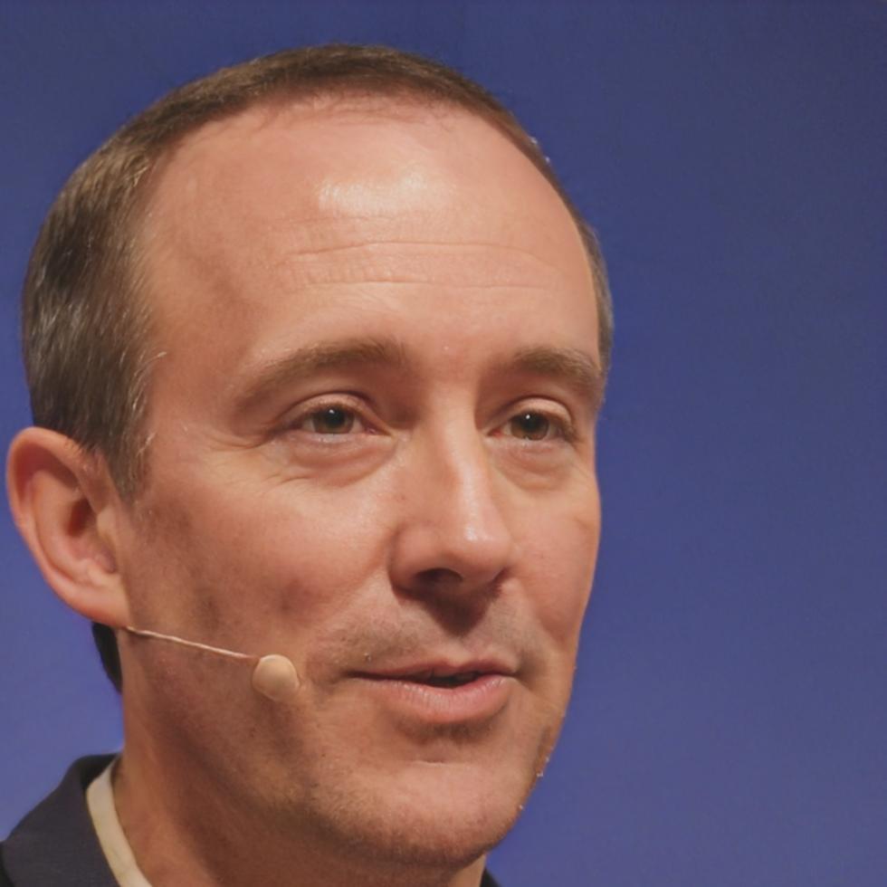 Senior Financial Instructor Marcus Whitfield reviewing curriculum materials